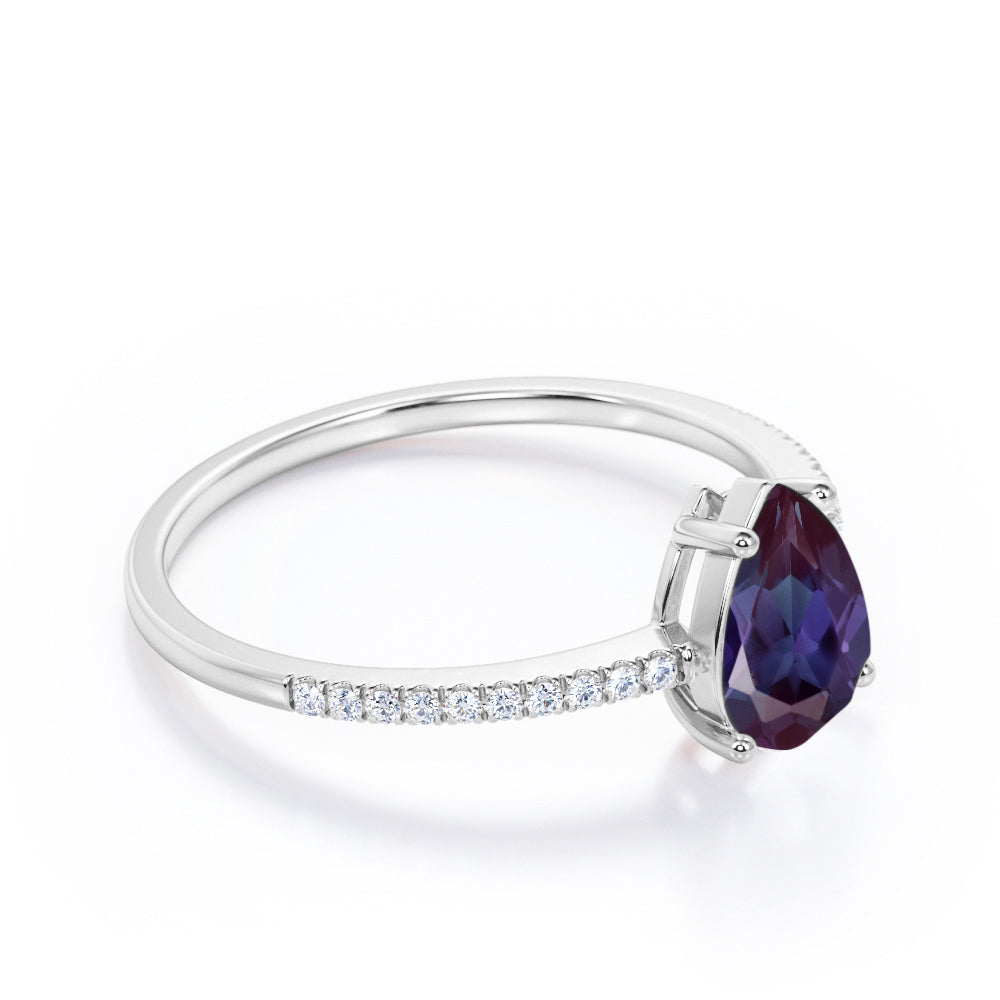 Classic 1.25 carat Pear cut Alexandrite and diamond eternity engagement ring in White gold
