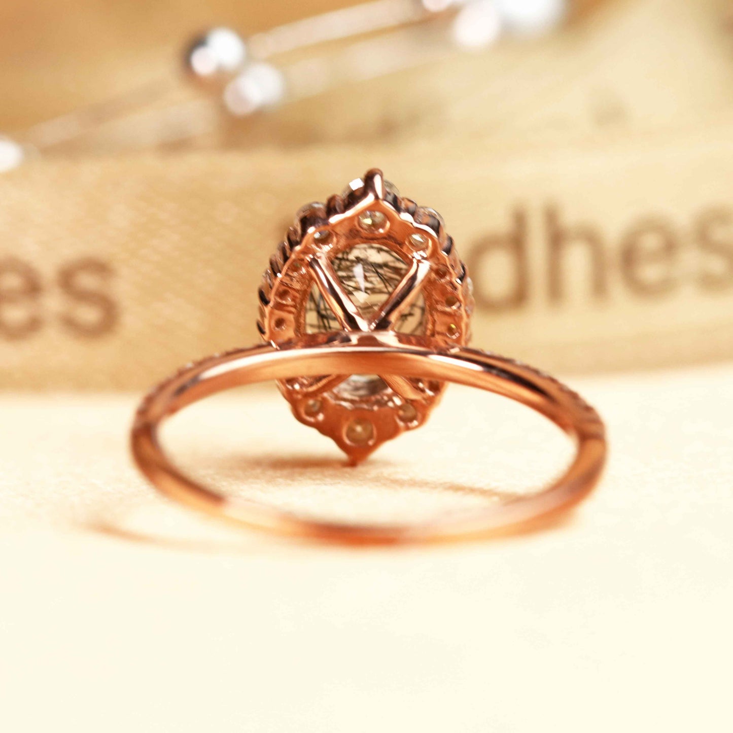 Vintage Halo 1.5 carat Oval Cut Rutilated Quartz and Diamond Half-mount Vintage Ring in Rose Gold