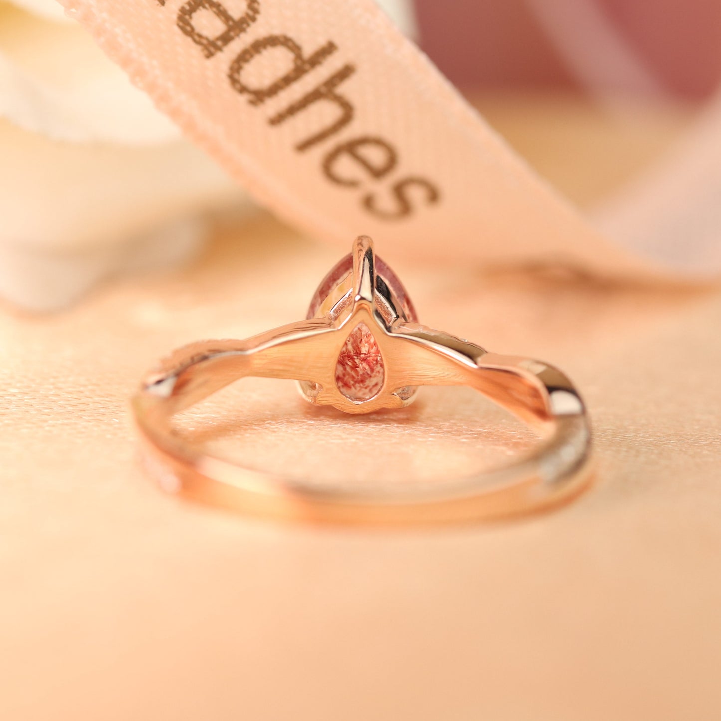 1.15 carat Tear Drop Cut Strawberry Quartz and Diamond Half-pave Twist Shank Solitaire Ring in Rose Gold