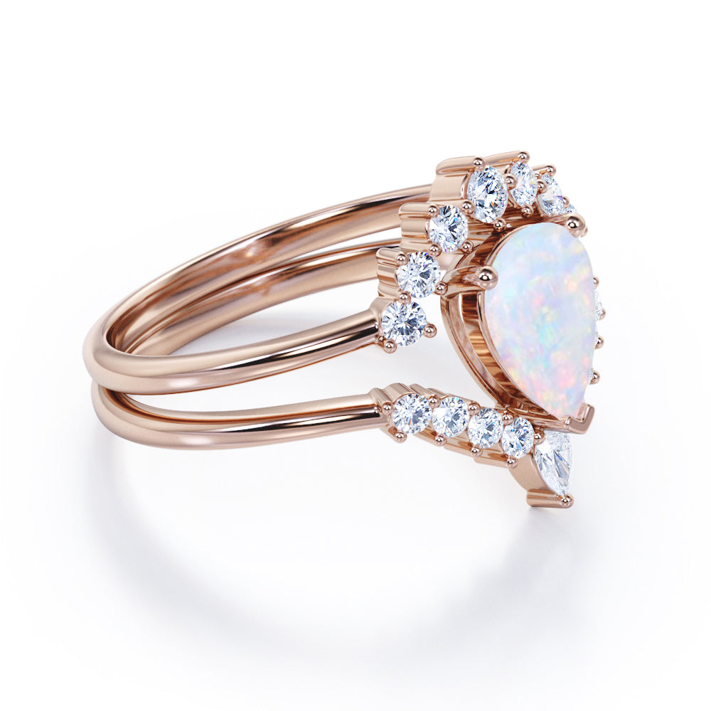 Royal Crown inspired 1.15 carat Pear cut Opal and diamond chevron wedding ring set for women in Rose gold