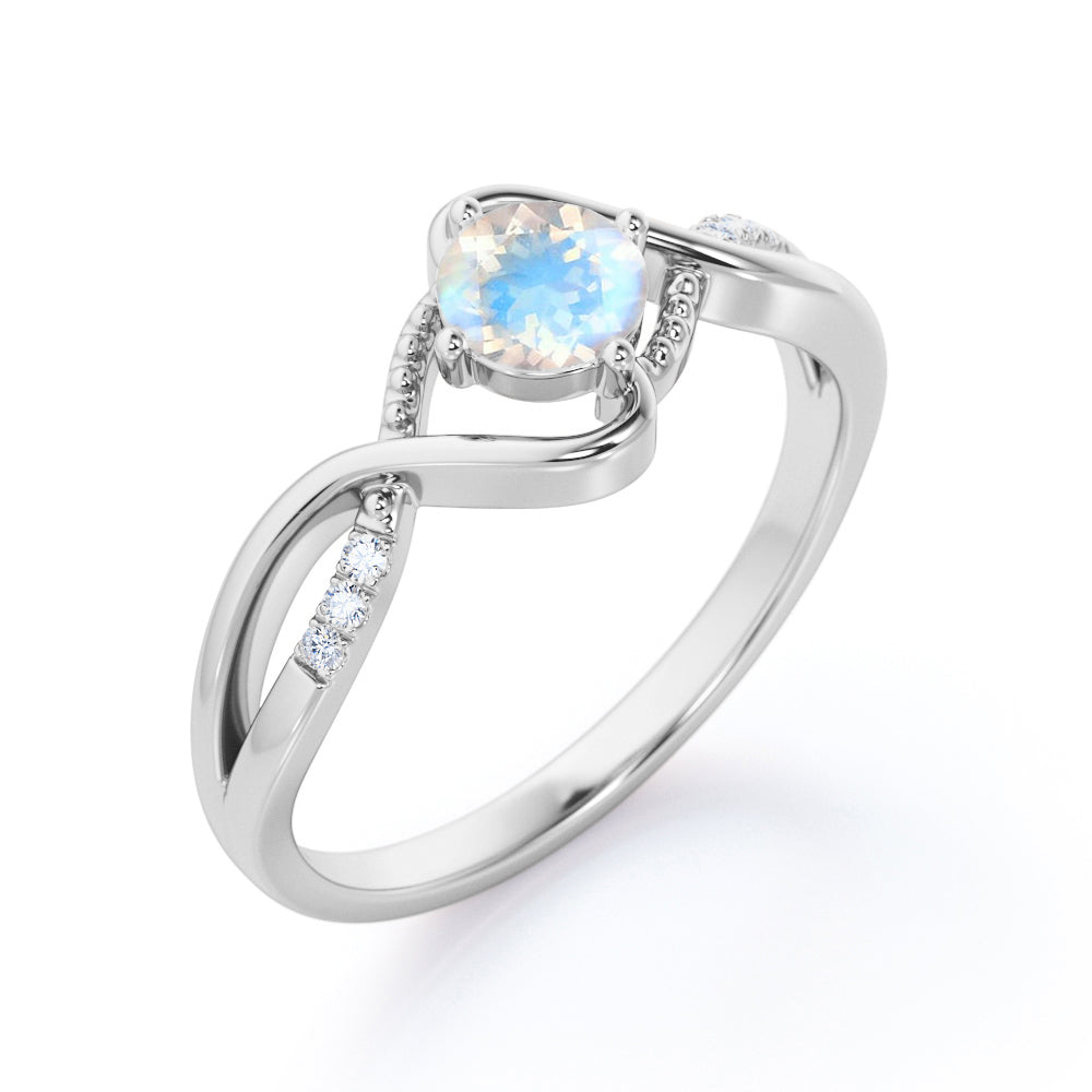 Trendy Twists 0.6 carat Round cut Rainbow Moonstone and diamond infinity pave engagement ring in White gold