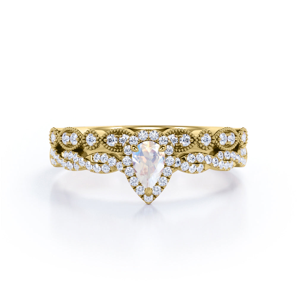 Art deco Milgrain 1.65 carat Pear cut Moonstone and diamond twisted pave engagement ring in yellow gold