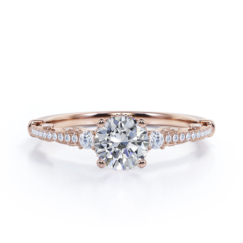 Triple stone 1.35 carat Round cut Moissanite and diamond art deco inspired engagement ring in Rose gold