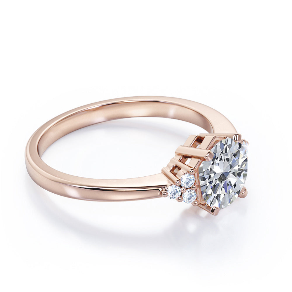 Classic 7 stone 1.1 carat Round cut Moissanite and diamond hexagon prong set engagement ring in rose gold