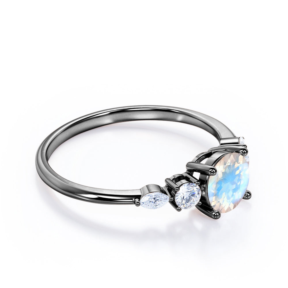 Artistic Five stone 1.1 carat Round cut Moonstone and diamond pinched shank engagement ring in Black gold