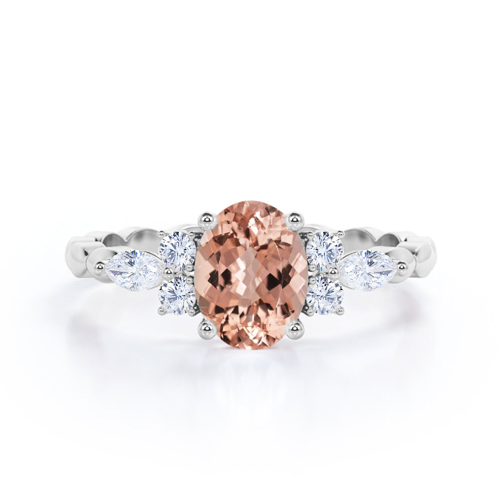 Twisted Bands 1.15 carat Oval shaped Peach Morganite and diamond flower style engagement ring in White gold