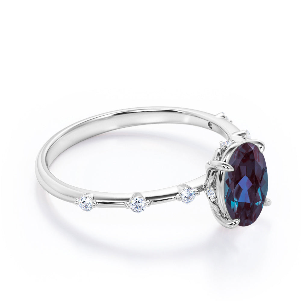 Twig style 1.1 carat Oval shaped Lab made Alexandrite and diamond nature inspired engagement ring in Black gold