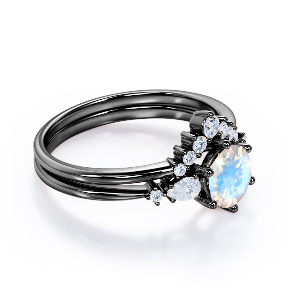 Antique Chevron 1.4 carat Round cut Blue Moonstone and diamond tapered style Bridal set for women in Black gold