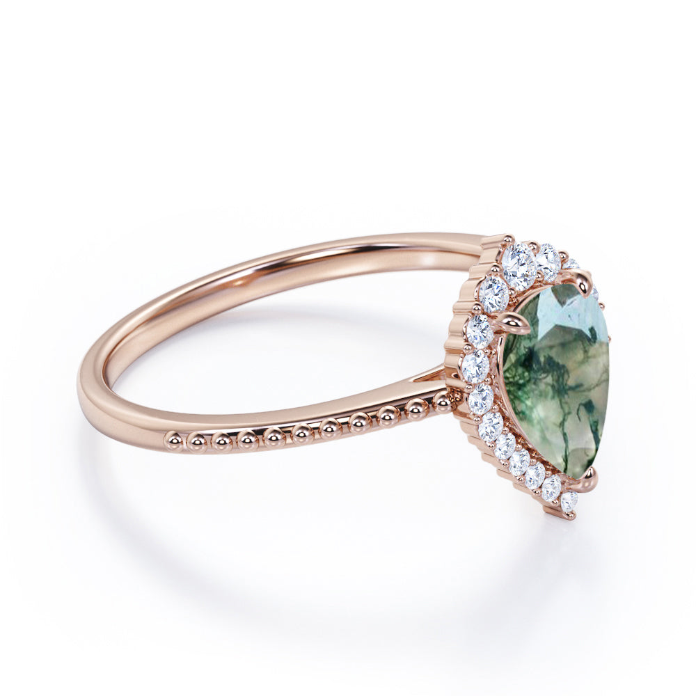 Royal inspired 1.2 carat Pear shaped Moss Green Agate and diamond Milgrain and halo engagement ring in Rose gold