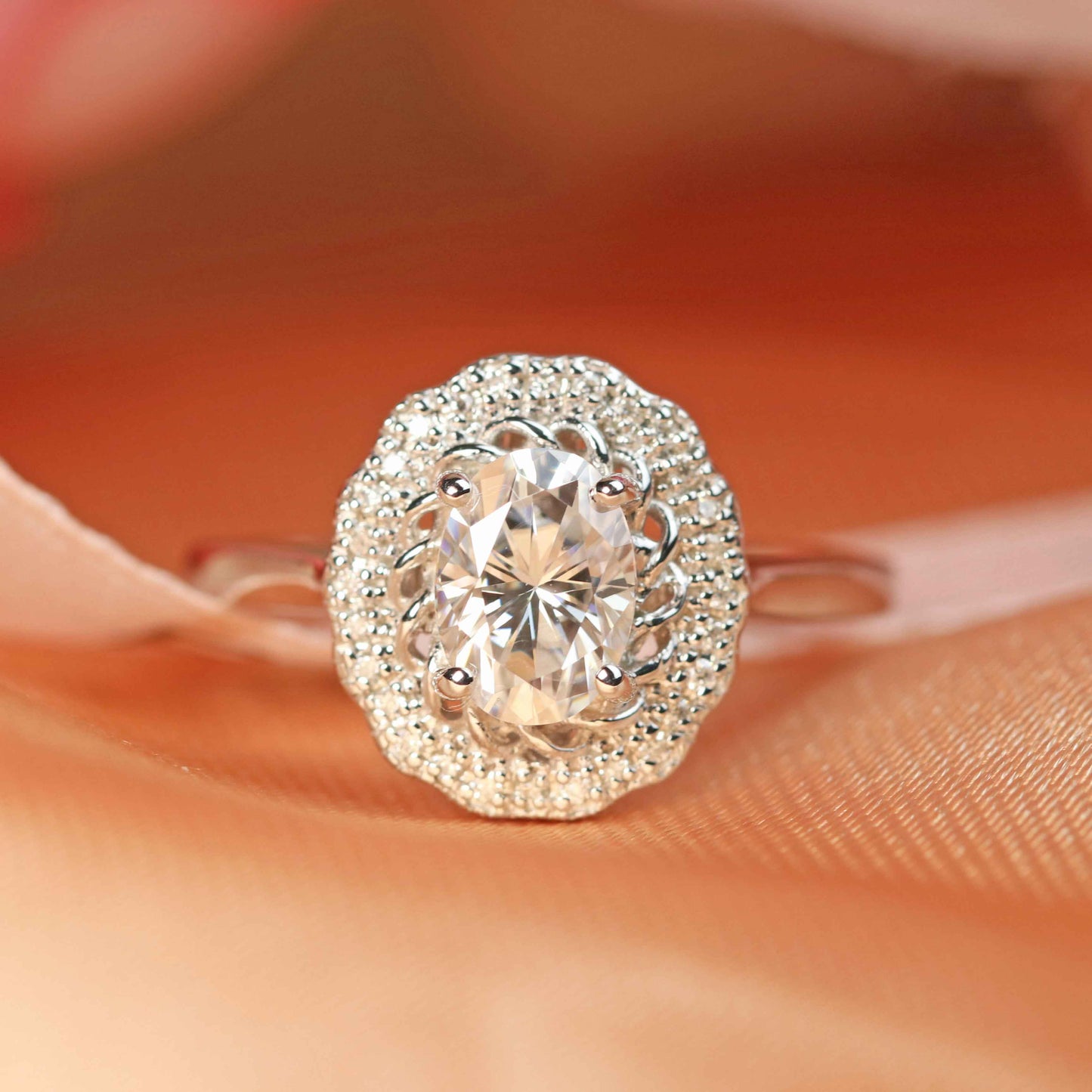 Classic bezel set 1.25 carat Oval cut Moissanite Engagement Ring in White Gold