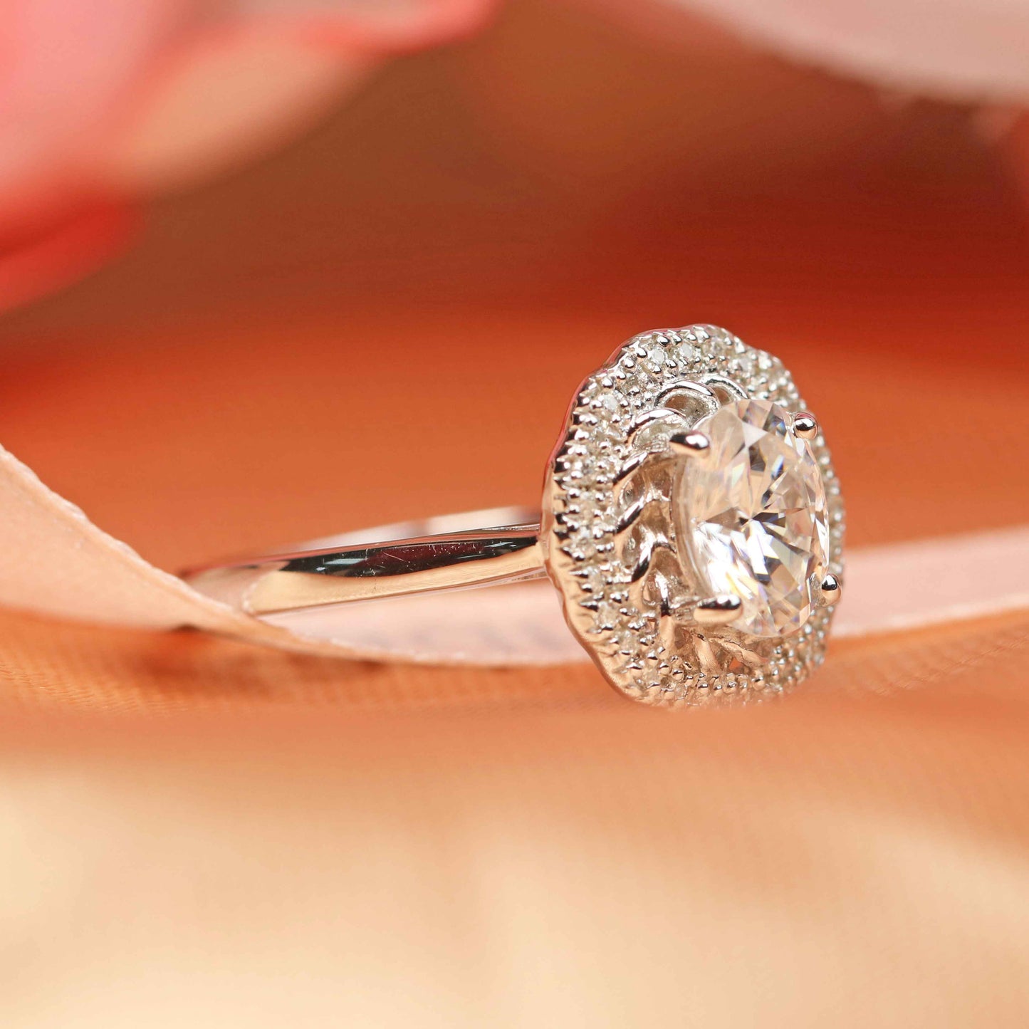 Classic bezel set 1.25 carat Oval cut Moissanite Engagement Ring in White Gold