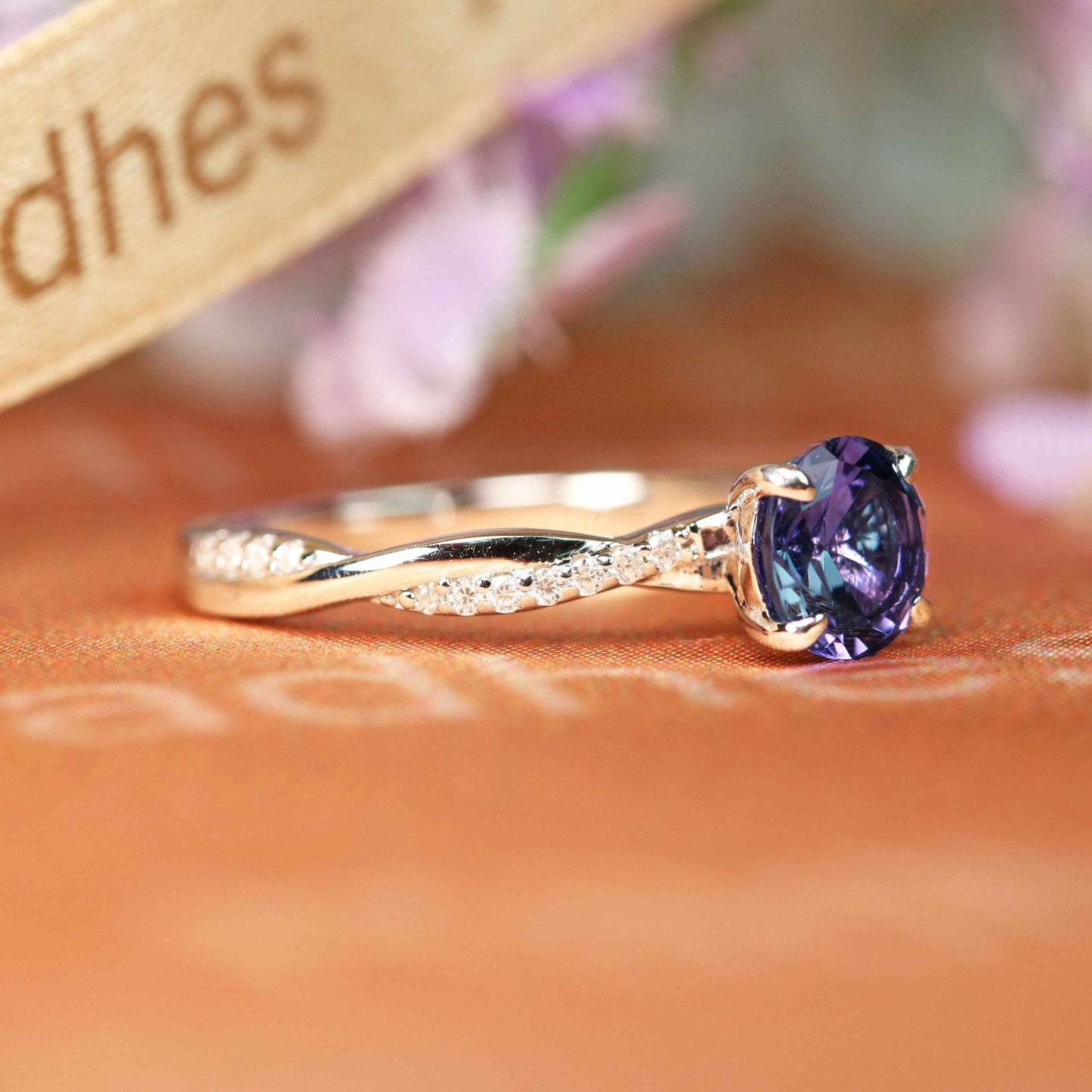 Solitaire 1.25 carat Round Shaped Alexandrite and Diamond Semi-pave Twisted Shank Anniversary Ring in White Gold