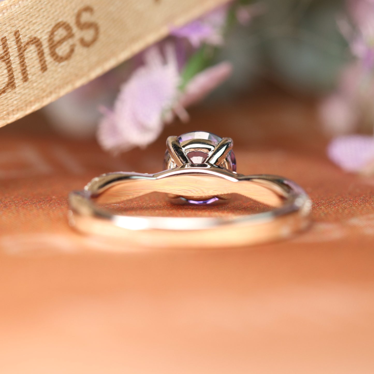 Solitaire 1.25 carat Round Shaped Alexandrite and Diamond Semi-pave Twisted Shank Anniversary Ring in White Gold