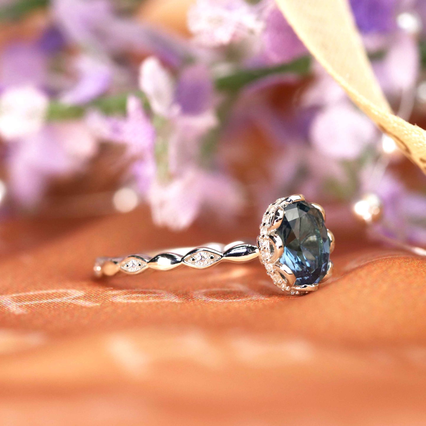 Unique 1.1 carat Oval Shaped Alexandrite and Diamond Halo Scalloped Engagement Ring in White Gold