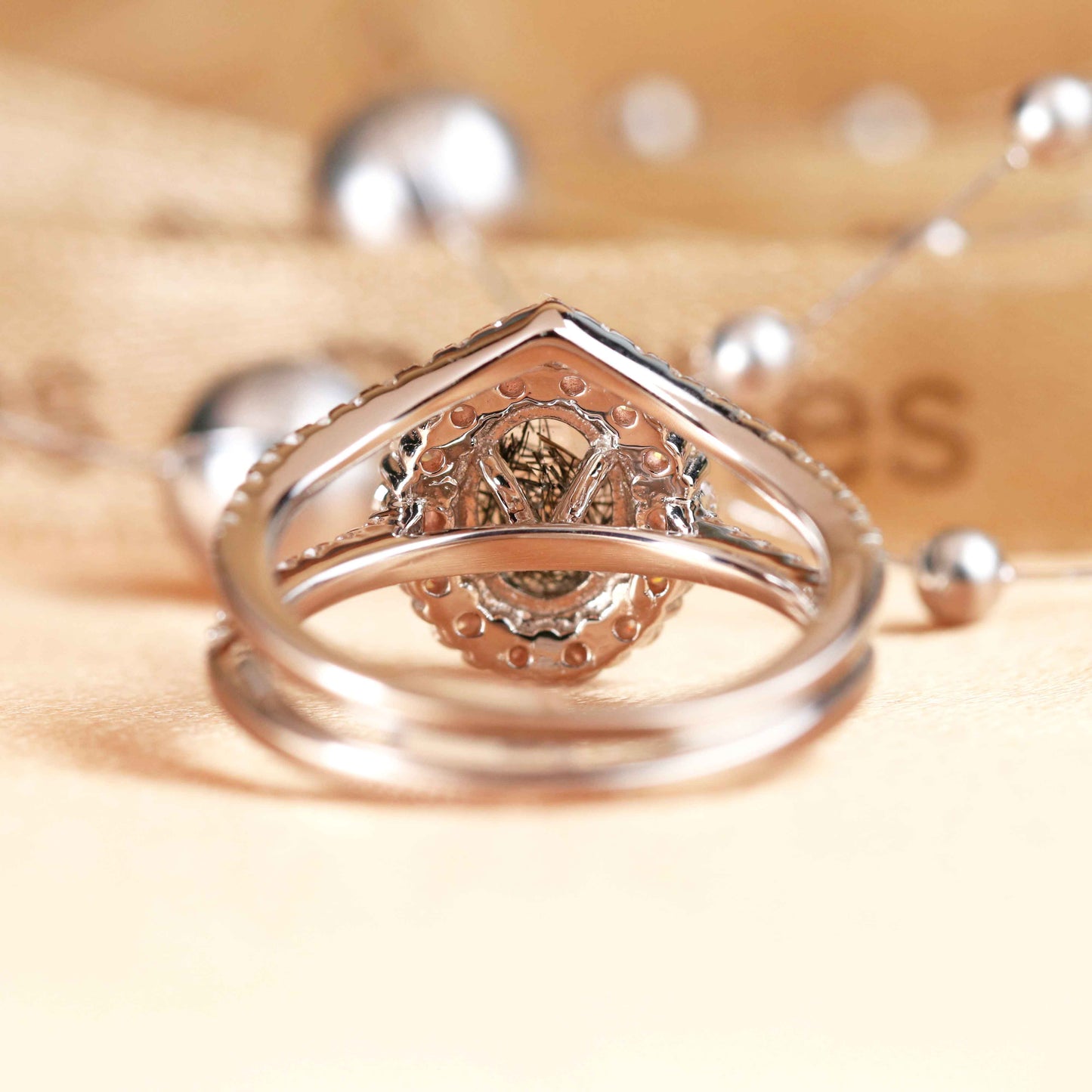 1.75 carat Oval Shaped Rutilated Quartz and Half-pave Diamond Floral Halo Wedding Set with Matching Chevron Wedding Band in White Gold