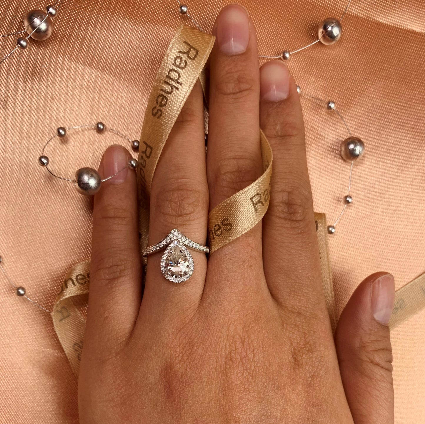 Half Halo 1.5 carat pear shape Moissanite Engagement Ring in Gold