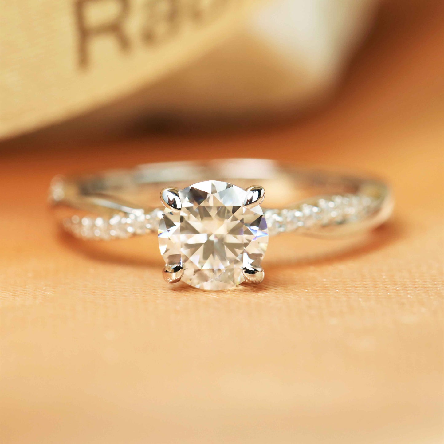 Infinity 1.25 carat Round cut Moissanite Engagement Ring in Gold