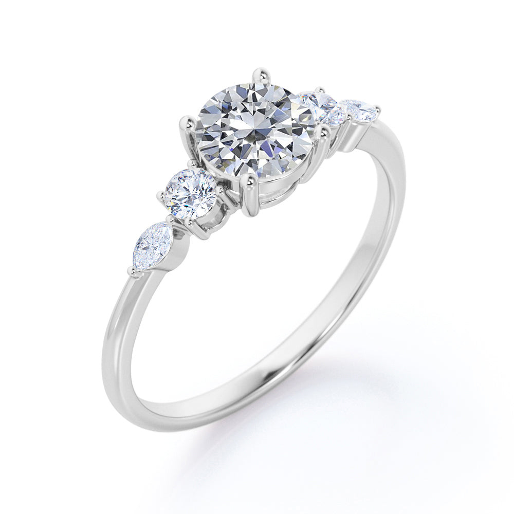 Basket setting 1.15 carat Round shaped Moissanite and diamond 5 stone engagement ring in White gold