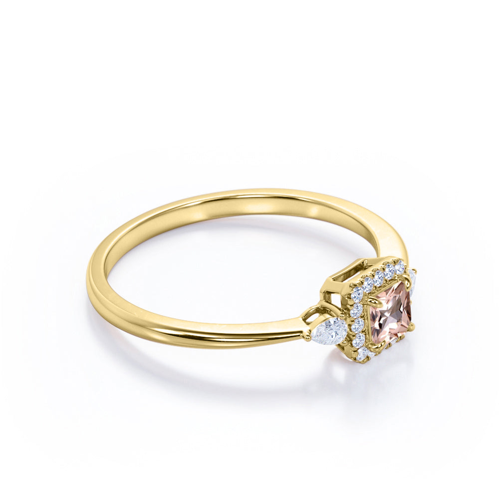 Exquisite three stone 0.75 carat Princess cut Peach Pink Morganite and diamond tapered style anniversary ring in Yellow gold