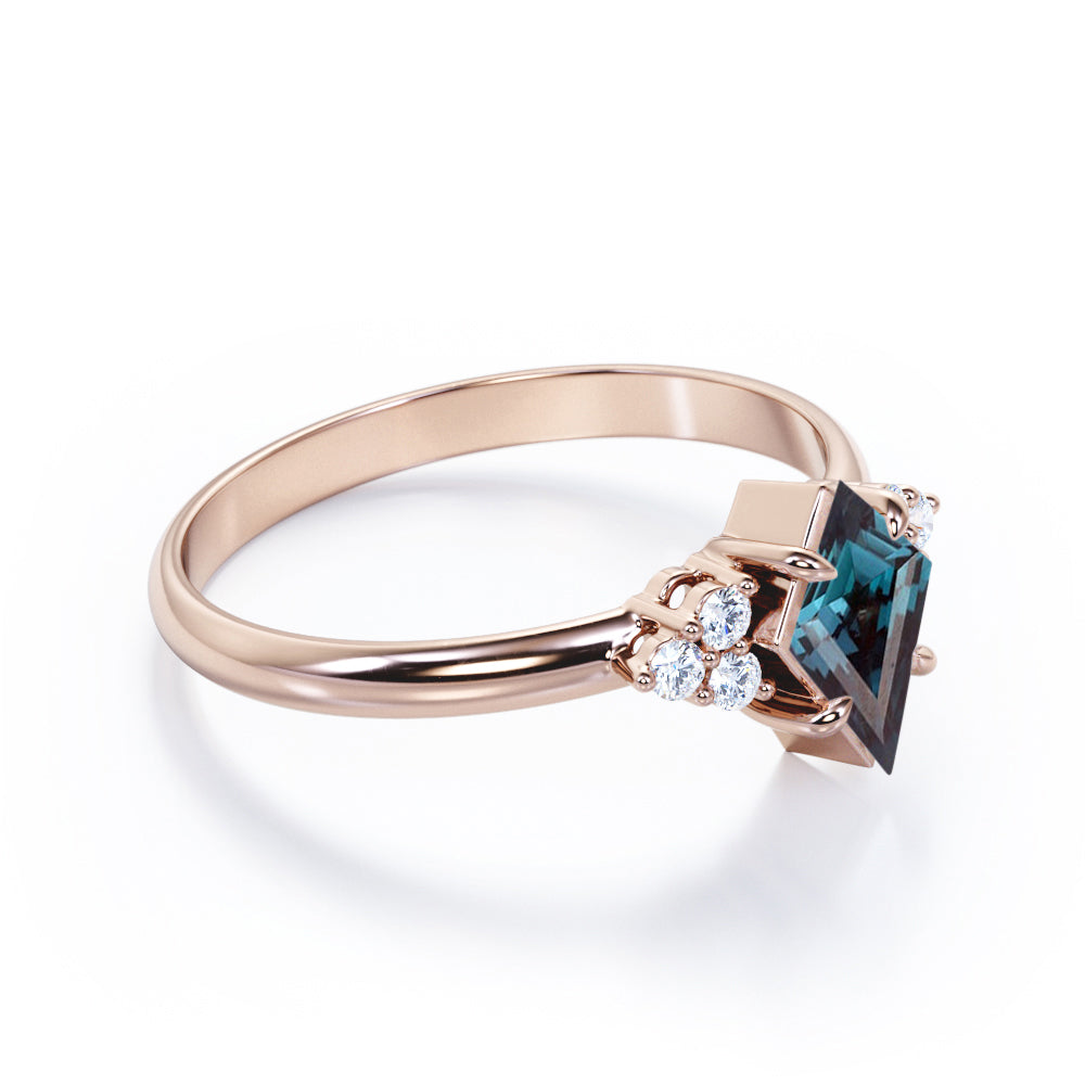 Eccentric Claw prong 1.1 carat Kite shaped Synthetic Alexandrite and diamond multistone engagement ring in Rose gold