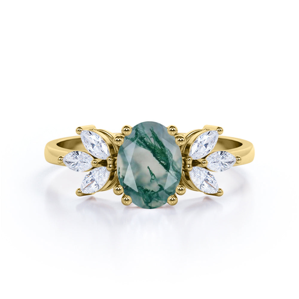 Double prong style 1.15 carat Oval cut Moss Green Agate and diamond seven stone engagement ring in yellow gold