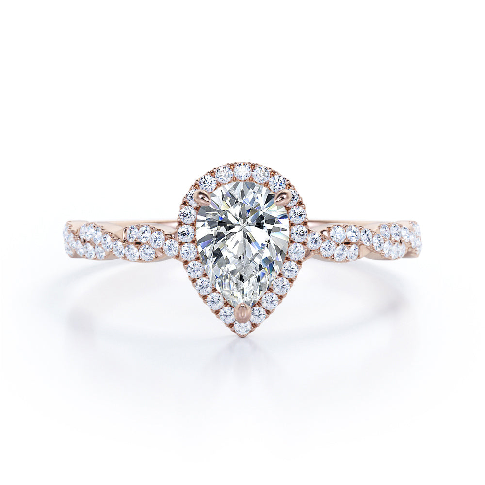 Twisted rope style 1.5 carat Pear cut Moissanite and diamond infinity halo engagement ring in Rose gold