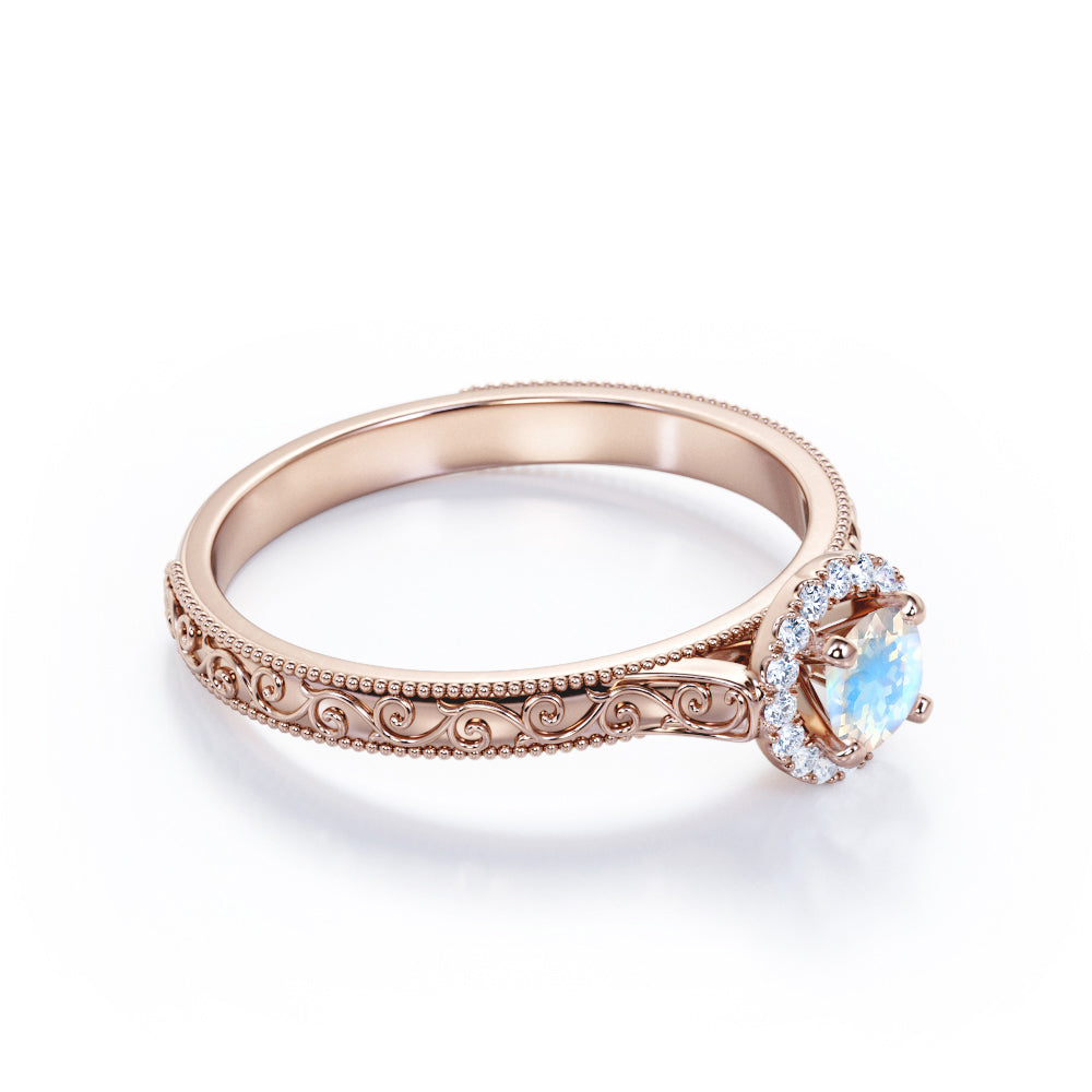 Ornamental Filigree 1.2 carat Round cut Moonstone and diamond halo engagement ring for women in Rose gold