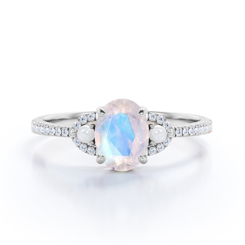 Pretty Pearls 1.5 carat Oval cut Moonstone and diamond traditional engagement ring in White gold
