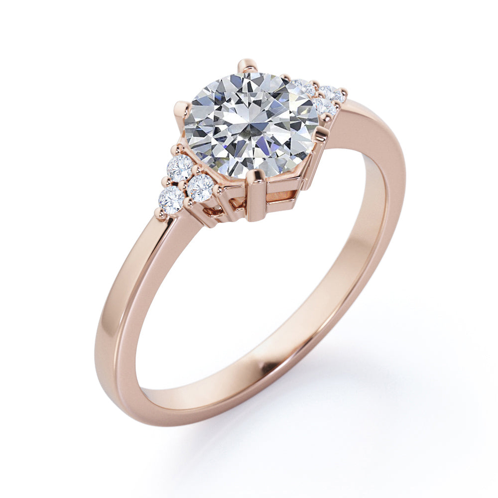 Classic 7 stone 1.1 carat Round cut Moissanite and diamond hexagon prong set engagement ring in rose gold