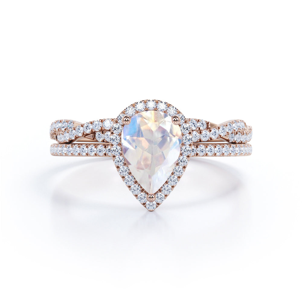 Exquisite 1.75 carat Pear cut Rainbow Moonstone Engagement ring with matching half eternity wedding ring band in gold