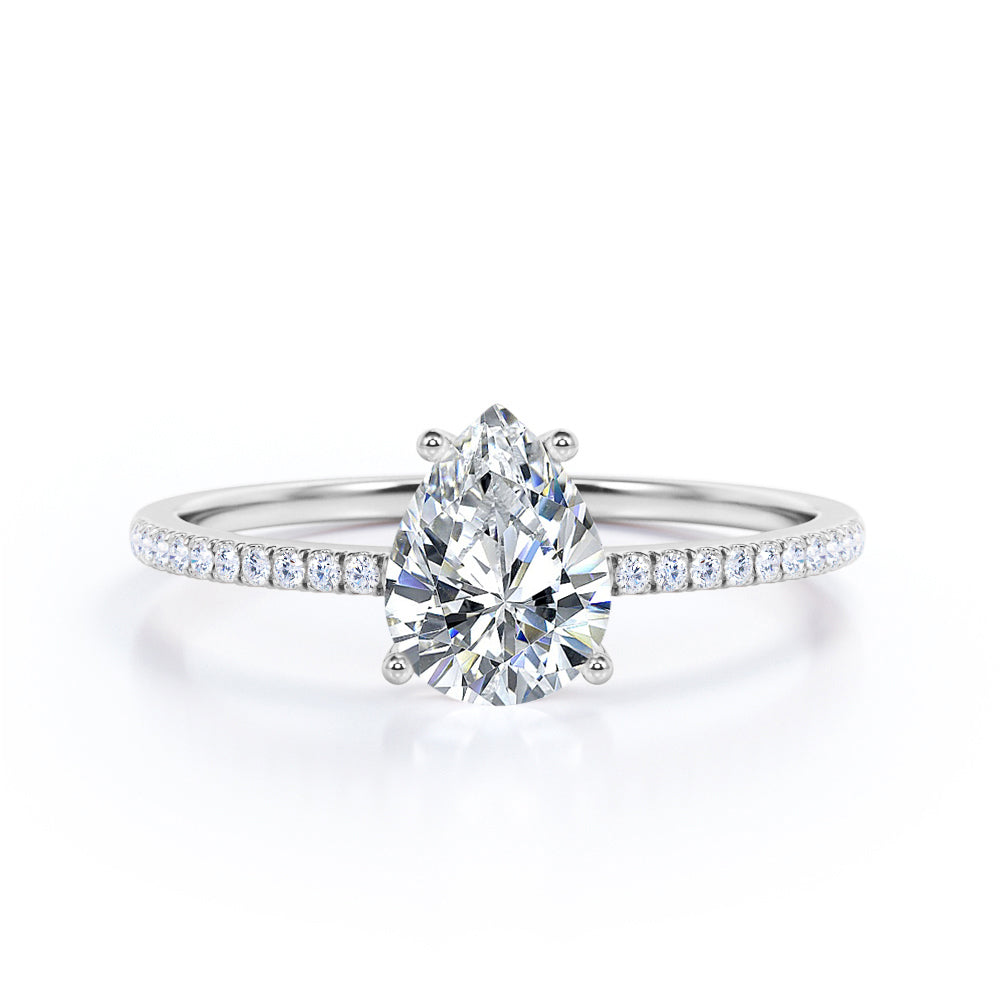 Elegant 1.2 carat Pear shaped Moissanite and diamond vintage prong engagement ring in Black gold