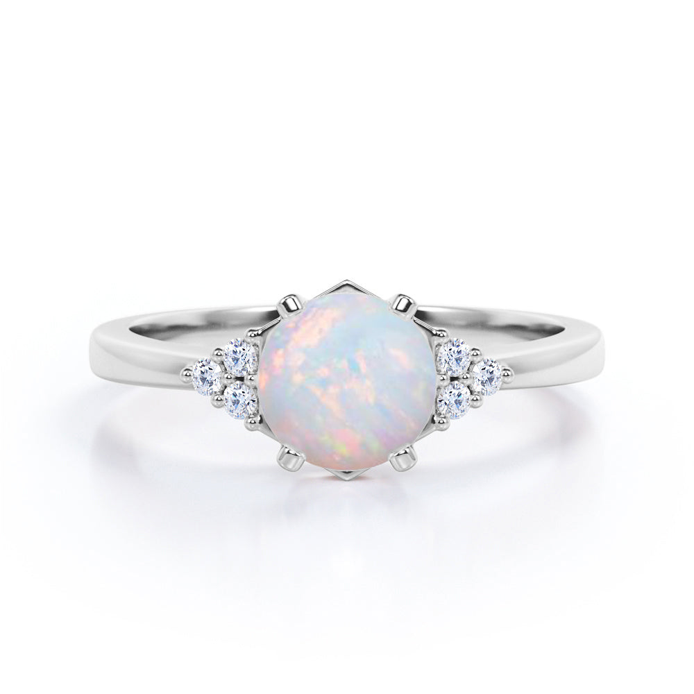Unique Tapered style 1 carat Round cut Opal and diamond 7 stone engagement ring in Yellow gold