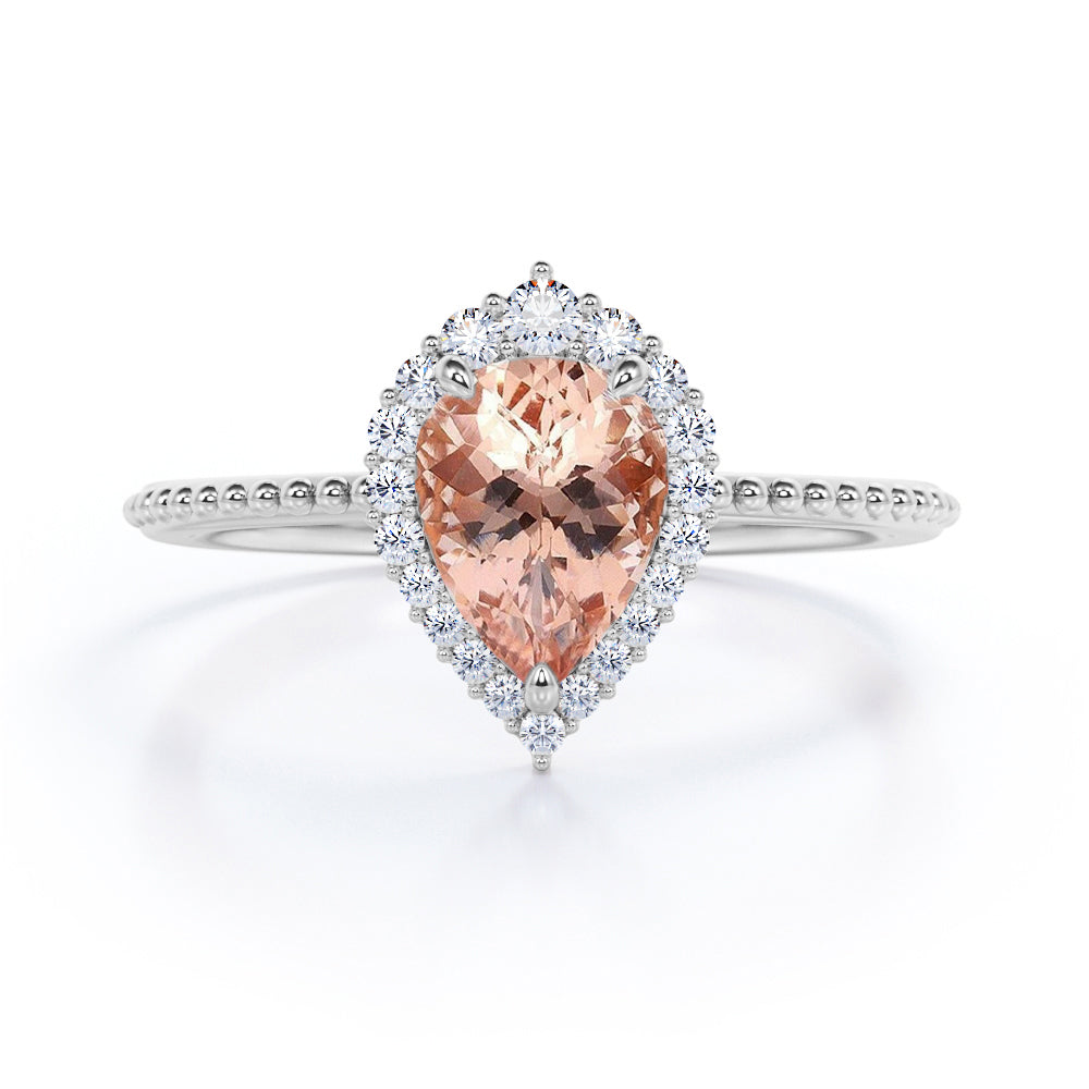 Eccentric Halo 1.25 carat Pear cut Morganite and diamond engraved vintage style engagement ring in Rose gold