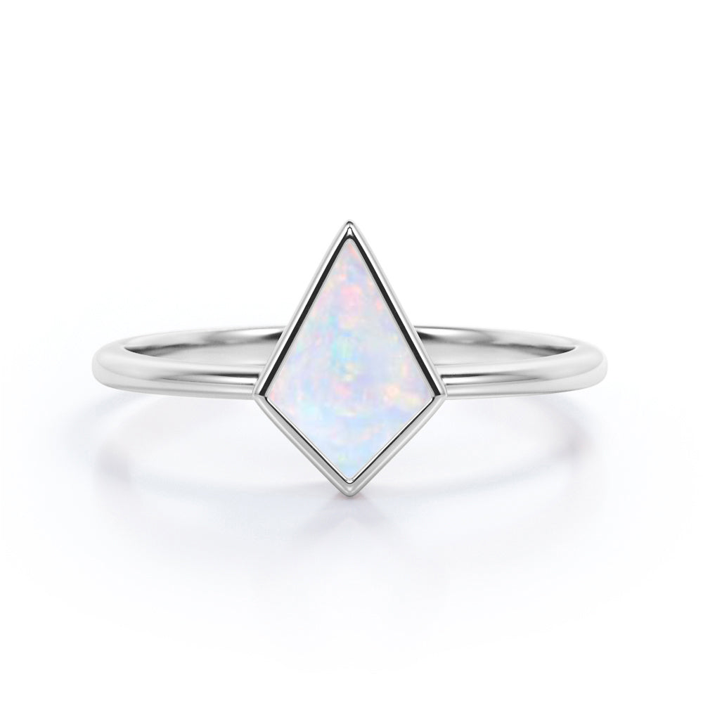 Solitaire Bezel 1 carat Kite shaped Ethiopian Welo Opal tapered shank engagement ring in Rose gold
