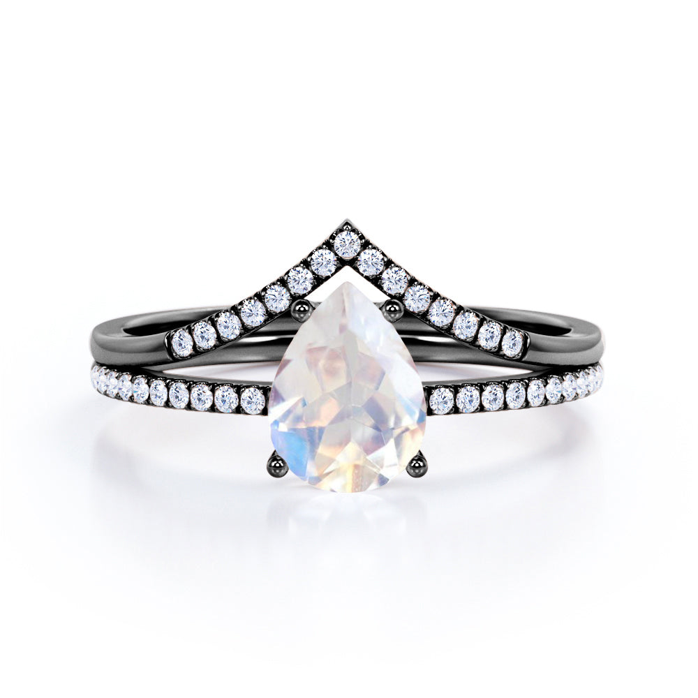 Magnificent 1.5 carat Pear cut Moonstone and diamond V-shaped wedding ring set in White gold