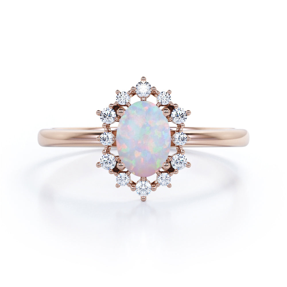Intricate cluster 1.15 carat Oval cut Ethiopian Opal and diamond art deco engagement ring in Black gold