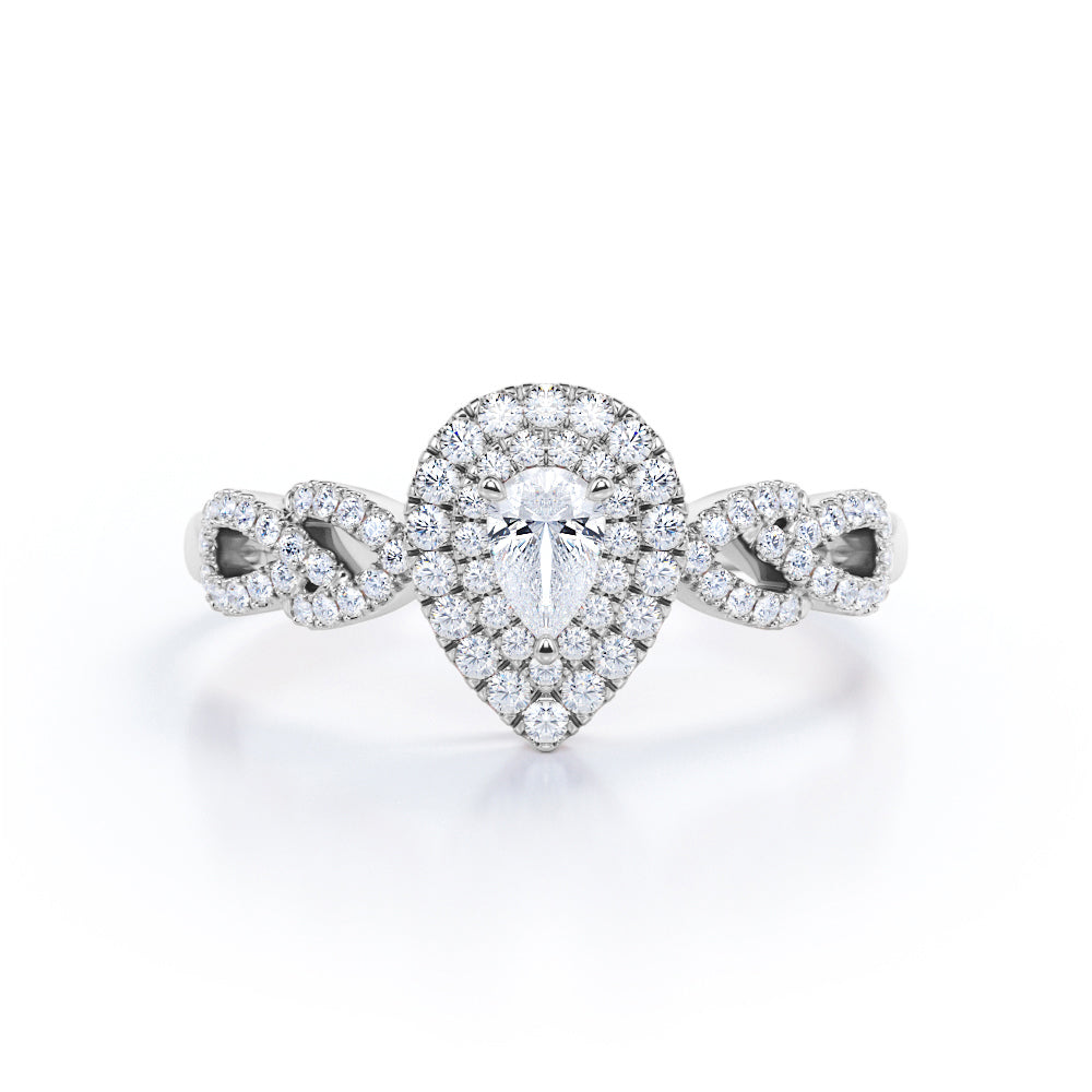 Stylish leaf inspired 0.75 carat Pear cut diamond double halo pear engagement ring in White gold