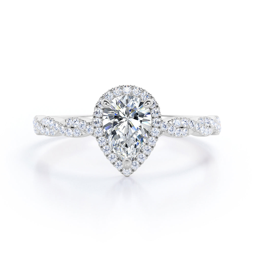 Twisted rope style 1.5 carat Pear cut Moissanite and diamond infinity halo engagement ring in Rose gold