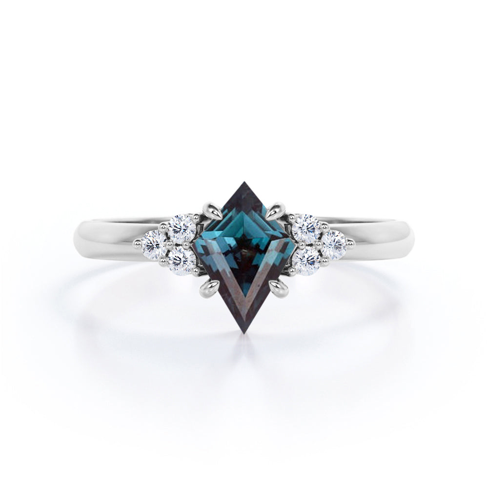 Eccentric Claw prong 1.1 carat Kite shaped Synthetic Alexandrite and diamond multistone engagement ring in Rose gold