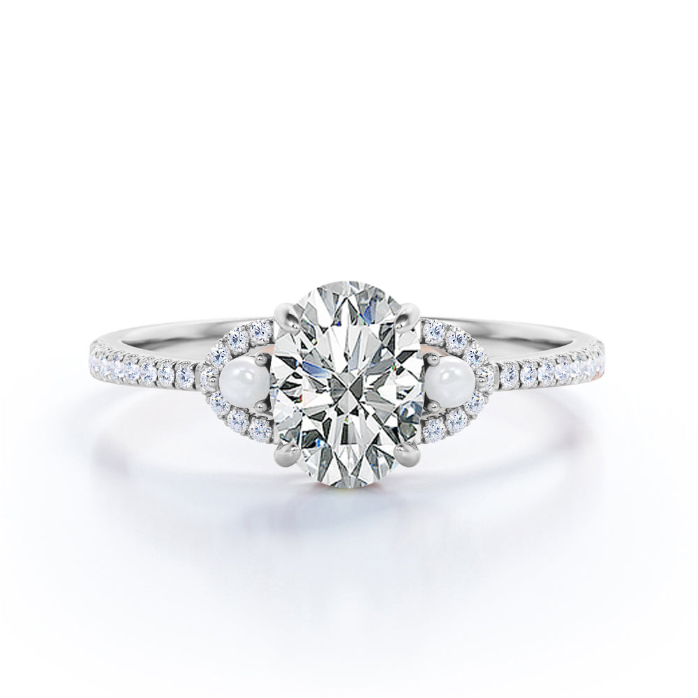 Vintage crescent style 1.35 carat Oval cut Moissanite, diamonds and freshwater pearl engagement ring in Rose gold
