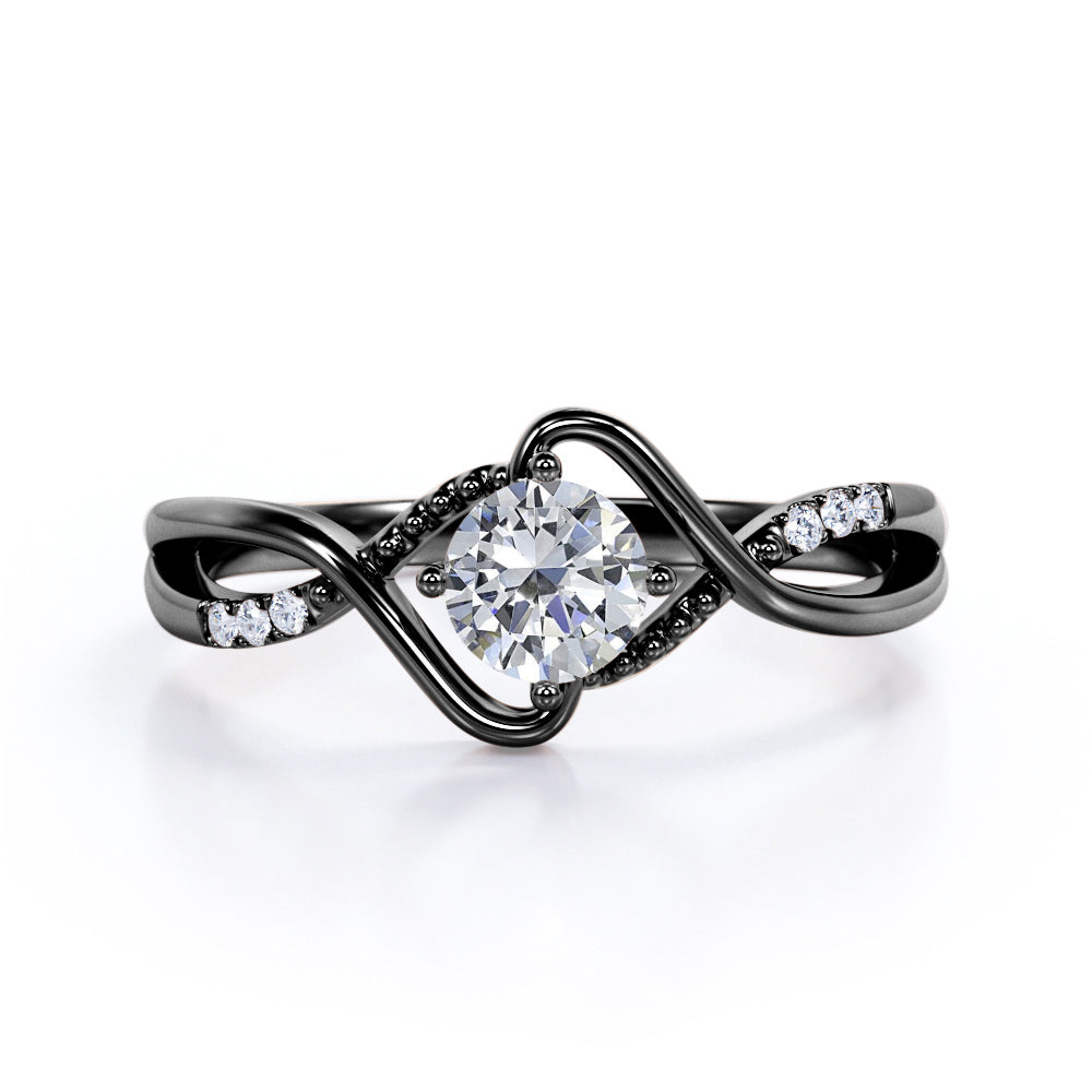 Vintage style twisted 1.25 Round cut Moissanite and diamond infinity engagement ring in Rose gold