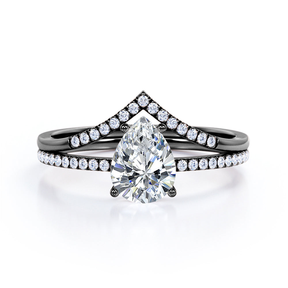 Vintage inspired 1.35 carat Pear cut Moissanite and diamond crown wedding ring set for women in rose gold