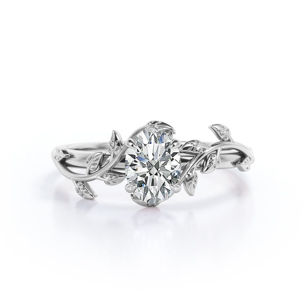 4 prong Solitaire 1 carat Oval cut butterfly style Moissanite Engagement ring for women in gold