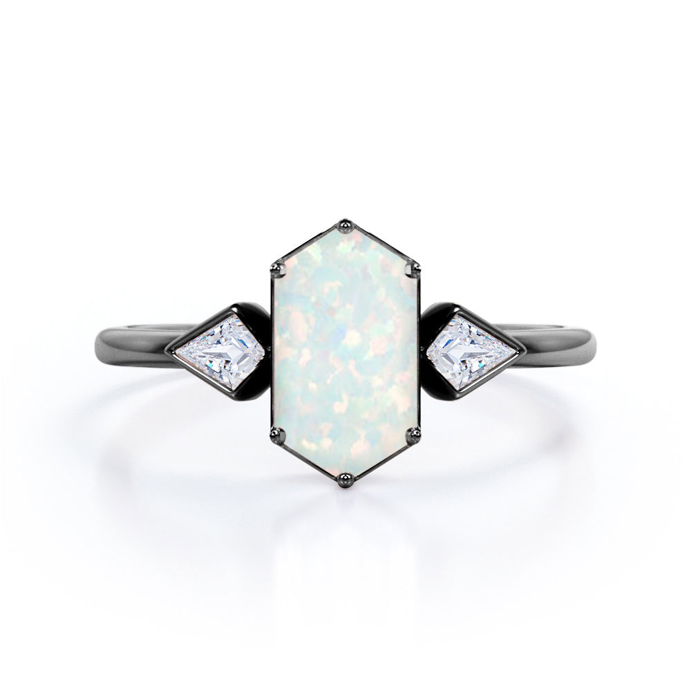 Elongated 1.10 carat Hexagonal Opal and marquise diamond bezel set engagement ring in Black gold