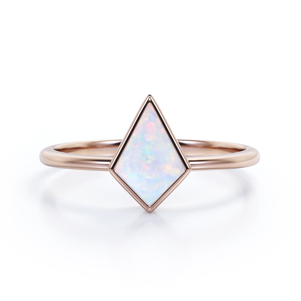 Solitaire Bezel 1 carat Kite shaped Ethiopian Welo Opal tapered shank engagement ring in Rose gold