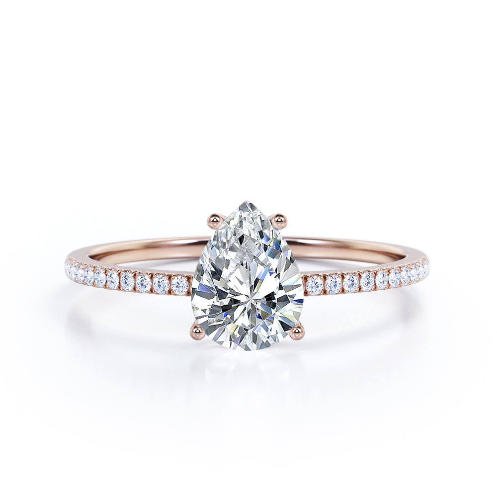 Elegant 1.2 carat Pear shaped Moissanite and diamond vintage prong engagement ring in Black gold