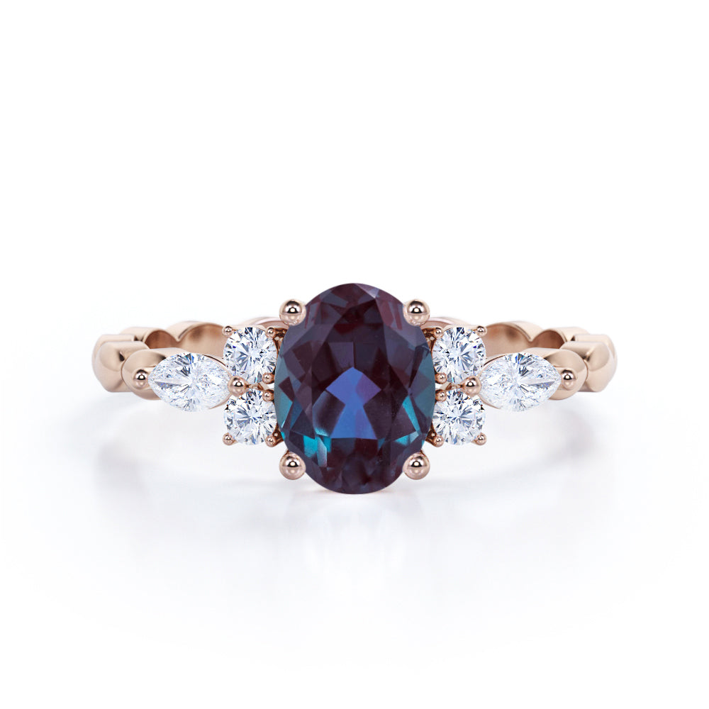 Scalloped bands 1.1 carat Oval cut Lab made Alexandrite and diamond prong style setting engagement ring in White gold