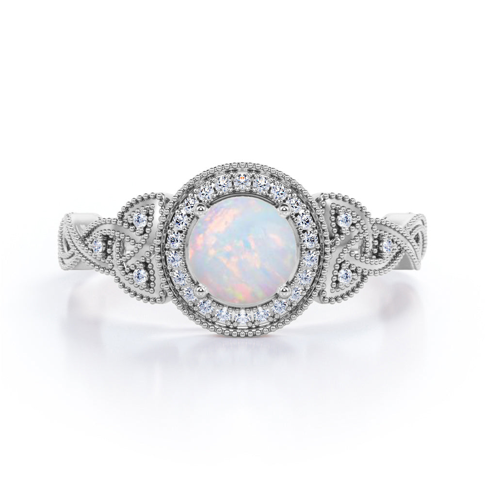 Grandiose 1.30 carat Round cut Ethiopian Opal and diamond twisted infinity halo engagement ring in White gold