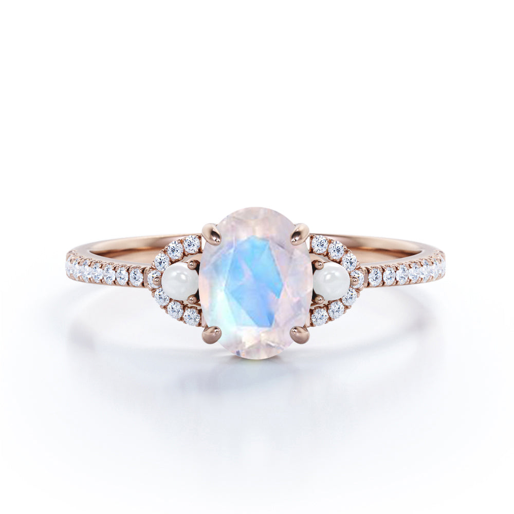 Pretty Pearls 1.5 carat Oval cut Moonstone and diamond traditional engagement ring in White gold