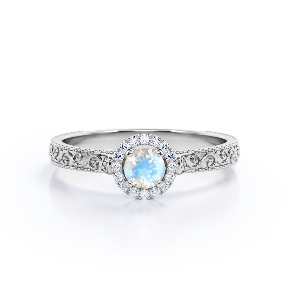 Ornamental Filigree 1.2 carat Round cut Moonstone and diamond halo engagement ring for women in Rose gold
